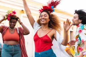 women dancing in a street festival