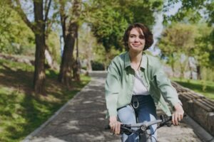 young woman on a bike